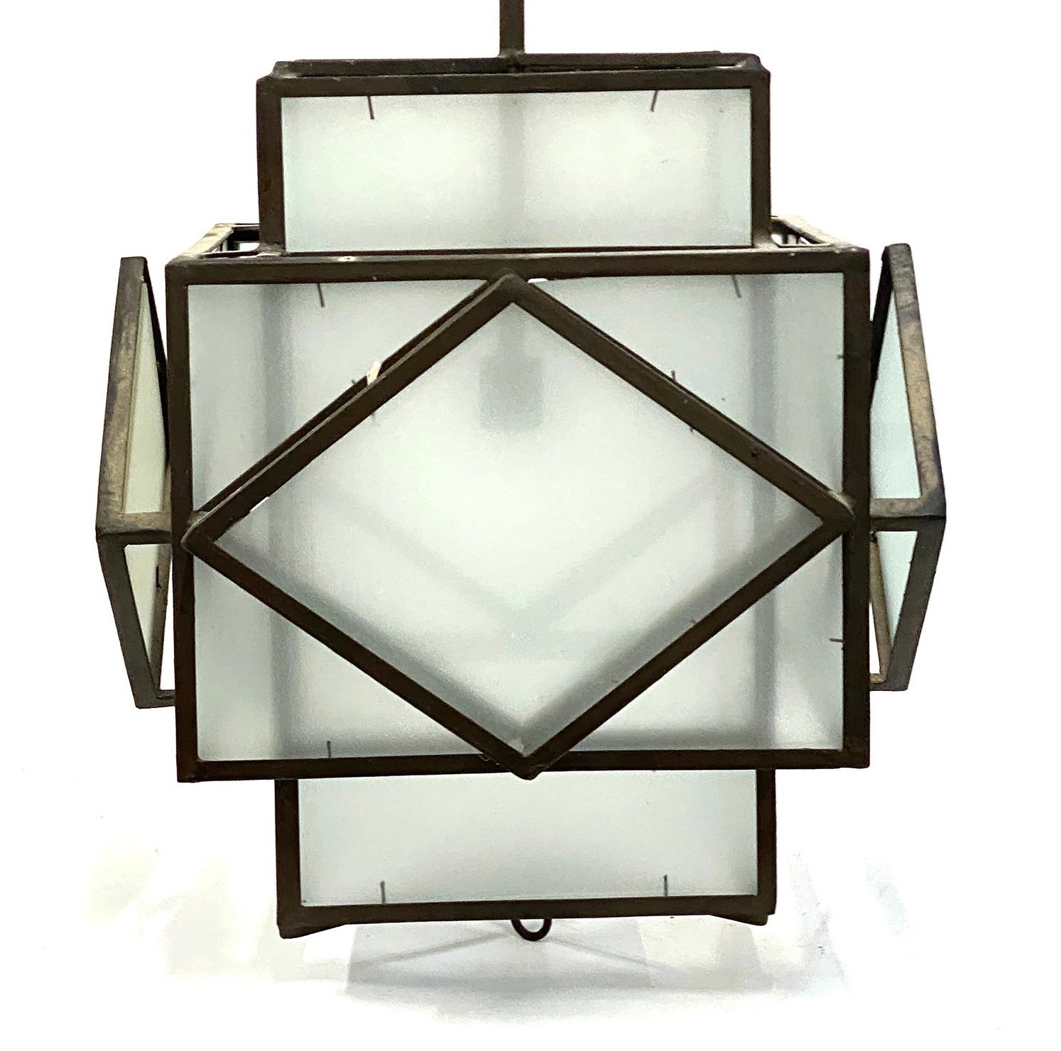 Interior design interest: a wrought metal and frosted glass Art Deco style geometric hanging lantern