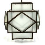 Interior design interest: a wrought metal and frosted glass Art Deco style geometric hanging lantern