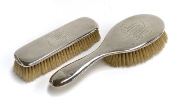 A sterling silver backed clothes brush and hair brush (2)
