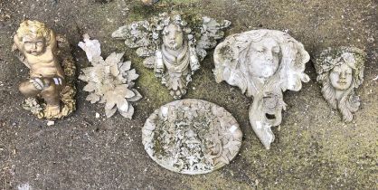 A composite stone wall planter in the form of a woman's head, approx 33cmW 38cmH; together with a