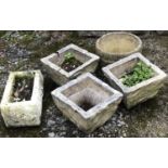 Five composite stone plant pots to include a set a three, approx 27x26x19cm, one of barrel form, and