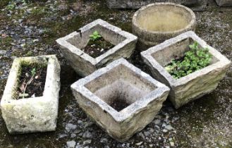 Five composite stone plant pots to include a set a three, approx 27x26x19cm, one of barrel form, and