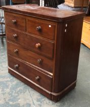A late 19th century mahogany chest of drawers, two short over three long, turned knobs,