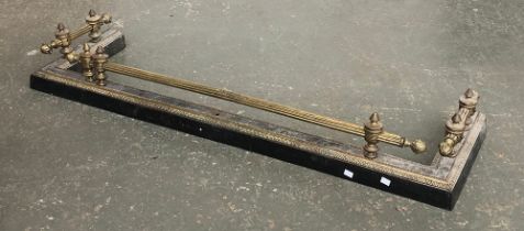 A 19th century cast iron and brass fender, 139cmW 38cmD