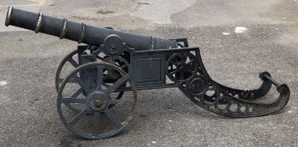 A cast iron model of a field gun, 158cm long overall