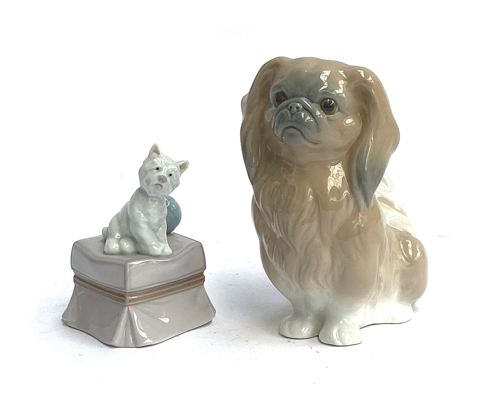 Two Lladro dog figurines: 'My Favourite Companion', model no. 6985; and 'Pekingese dog', model no.