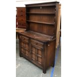 A York Rose Ercol style stained oak dresser, 122cmW