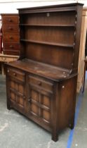 A York Rose Ercol style stained oak dresser, 122cmW