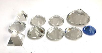 Ten glass paperweights, eight of diamond form, two of pyramid form