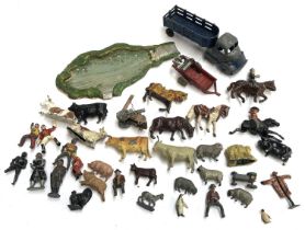 A quantity of lead horses, riders, figures, farmyard animals, accessories etc, to include