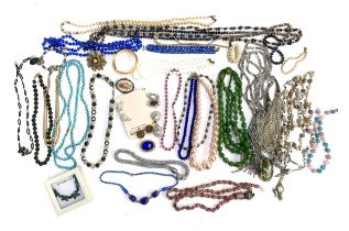 A quantity of costume jewellery, mainly beaded necklaces, to include a green hardstone necklace