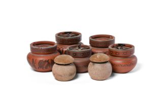 A quantity of 19th century English red stoneware Comprising five black encaustic decorated