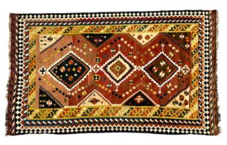 A Qashqai kilim wool rug, yellow border, with three lozenges, 258x154cm