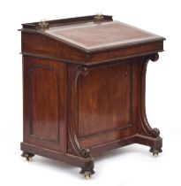 A Victorian mahogany Davenport desk, with three quarter gallery and two inset cut glass inkwells,