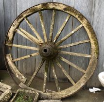 A 16 spoke wooden wagon wheel with metal rim, 126cmD
