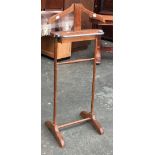 An oak gent's dress stand, with chrome railed and stud box, 102cmH