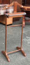 An oak gent's dress stand, with chrome railed and stud box, 102cmH