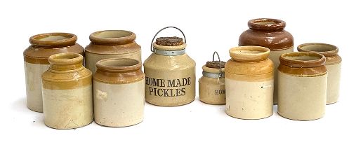 A quantity of ten vintage stoneware jars, to include 'Home Made Pickles', the tallest 22cmH