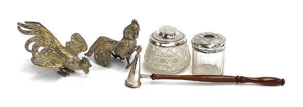 Two silver topped dressing table jars; a plated snuffer and two brass cocks