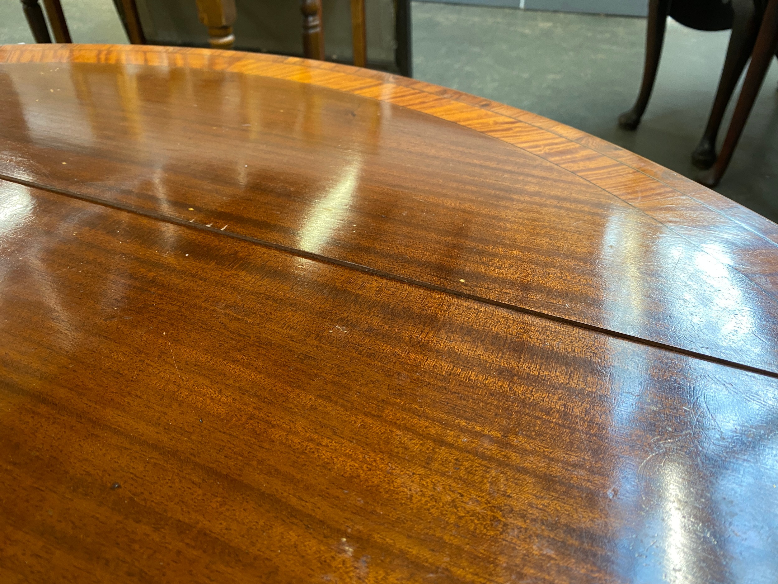 A George III mahogany and satinwood banded D end dining table, the central section with two drop - Image 6 of 6
