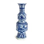 A Chinese style blue and white hexagonal form vase with flared rim, 31cmH