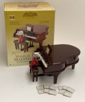 A Gold Label 'Magical Musical Maestro Mouse with Baby Grand Piano', in box