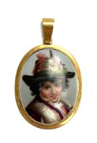 A yellow metal mounted painted porcelain pendant depicting a peasant boy, 2.7cm wide, 6.1g