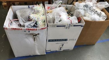 Three large boxes of Christmas decorations, tinsel, figurines, bells, tree ornaments, gift bags,