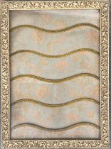 A framed textile with metal thread detail, 56x41cm