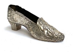 A silver model of a shoe, with import marks and hallmarked for London 1897, 19cmL, 196g