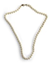 A cultured pearl single strand necklace with a 14ct gold clasp, the pearls approx. 0.8cmD, 61cmL