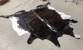 A cowhide rug, approx. 230x217cm