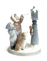 A Lladro figure group, 'Holiday Wishes', no. 8010, 25cmH, in original box