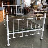 A white painted brass double bed, 136cmW the headboard 144cmH