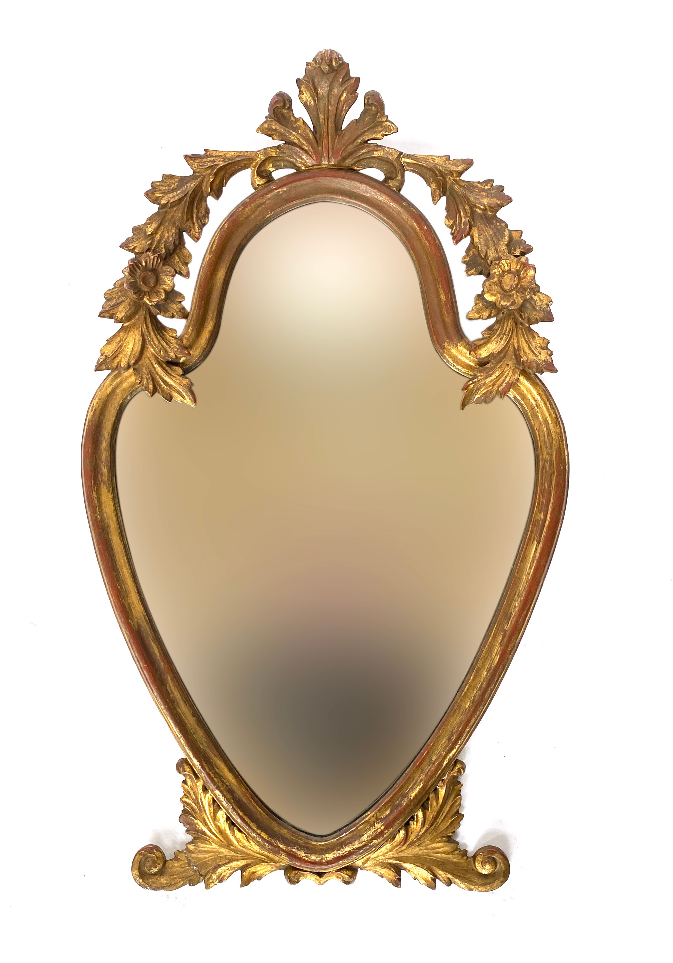 A gilt gesso 20th century Italian mirror, the shaped plate with carved foliate cresting; 80cm high