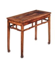 A 20th century Chinese hardwood altar table, 127cm wide, 43cm deep, 83cm high