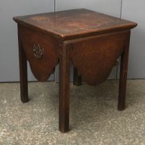 A George III oak commode stool, having twin handles carry, 49x56x51cmH