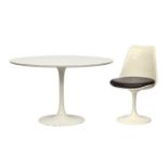 A white Knoll Eero Saarinen 'Tulip' style circular dining table with white formica top, 121cm