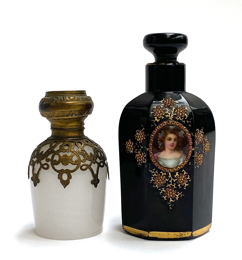 A 19th century French gilt metal mounted dressing table bottle, the lid set with a glazed picture;