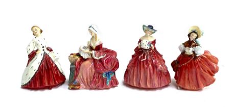 Four Royal Doulton lady figurines: 'The Skater', "Genevieve', 'Penelope' and 'The Ermine Coat',