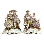 A pair of early 20th century pseudo Meissen porcelain figures of courting couples in continental