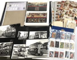 A mixed lot to include Royal Mail presentation packs, postcards, cigarette card albums, Rothman