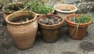 Six plant pots to include two pairs, one pair 33cmH 33cmD; the other 27cmH 35cmD