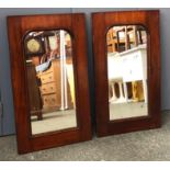 A pair of 19th century mahogany framed mirrors (formerly cupboard doors), each 76x44cm