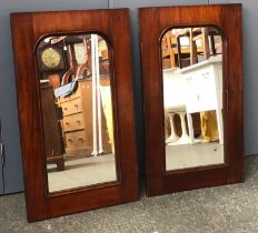 A pair of 19th century mahogany framed mirrors (formerly cupboard doors), each 76x44cm