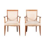 A pair of mid century beech open armchairs, each 87cm high, 56cm wide, 52cm deep