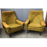 A pair of mid century armchairs with teak legs, 78cmW