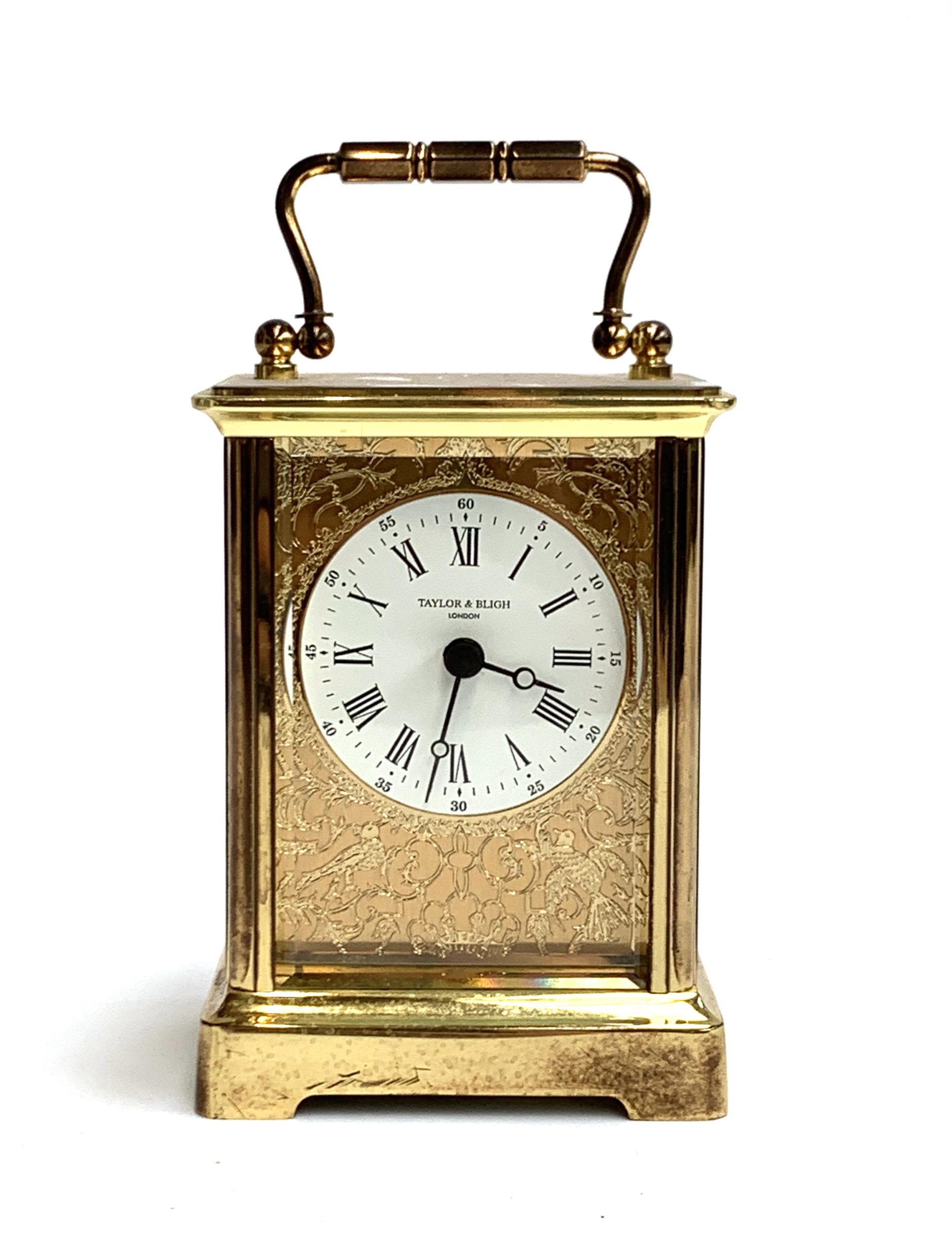 A gilt metal carriage clock, the dial signed Taylor & Bligh, 11cmH