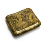 A Japanese damascene style brass cigarette case, one side depicting pagodas and Mt. Fuji, the