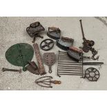 Various ironmongery, to include meat hooks, box irons, 'The Monarch' two horse corn drill; trivets